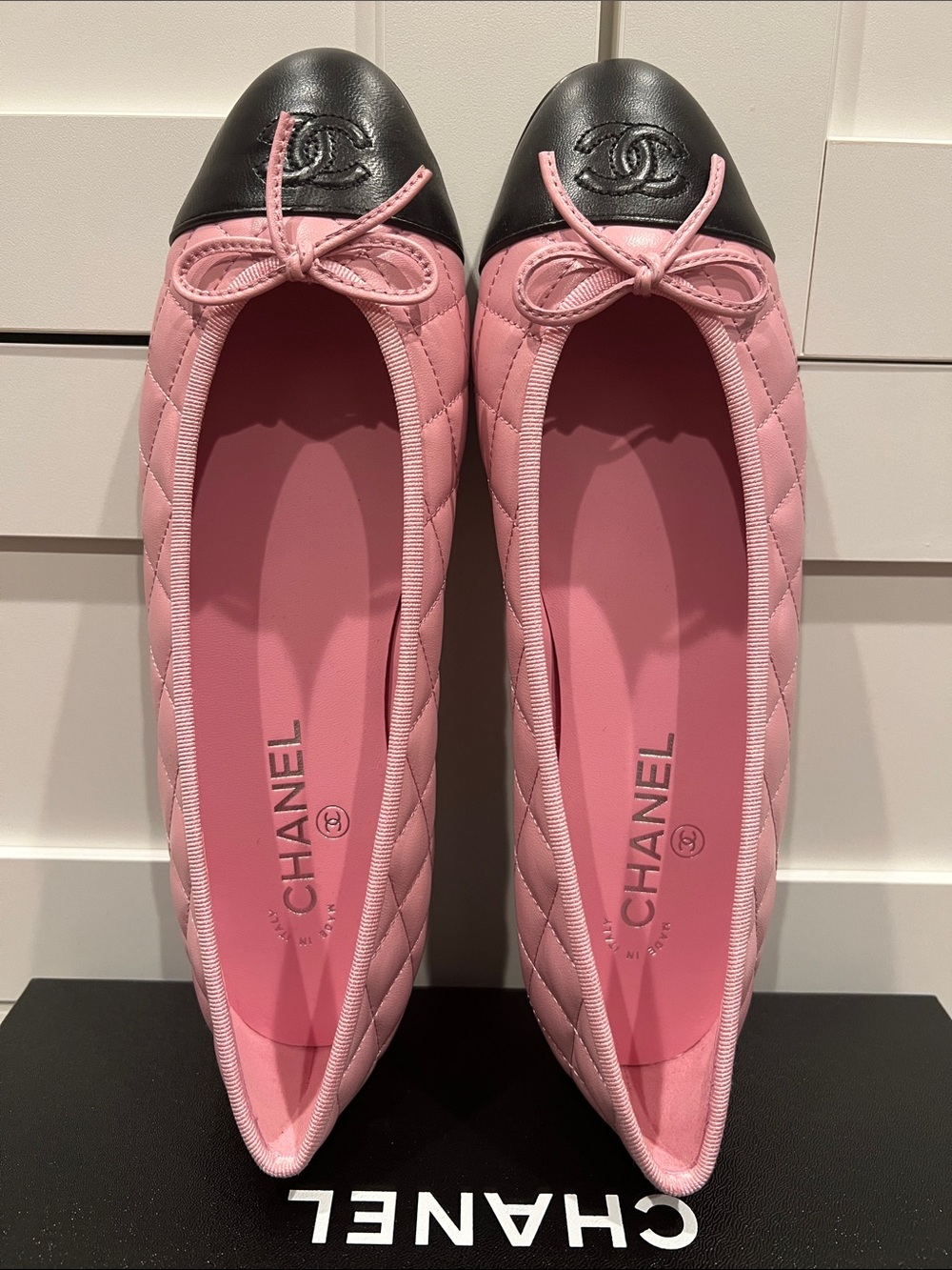 CHANEL Pink Quilted Leather Ballet Flats with Black Cap Toe